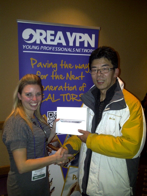 Amie Ferris and the winner of the draw for an iPad.