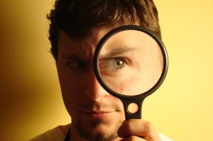 person-with-magnifying-glass